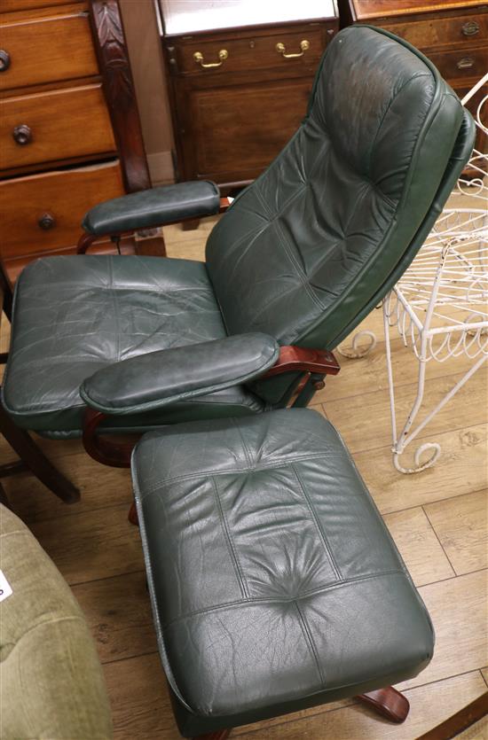 A leather reclining chair and a footstool